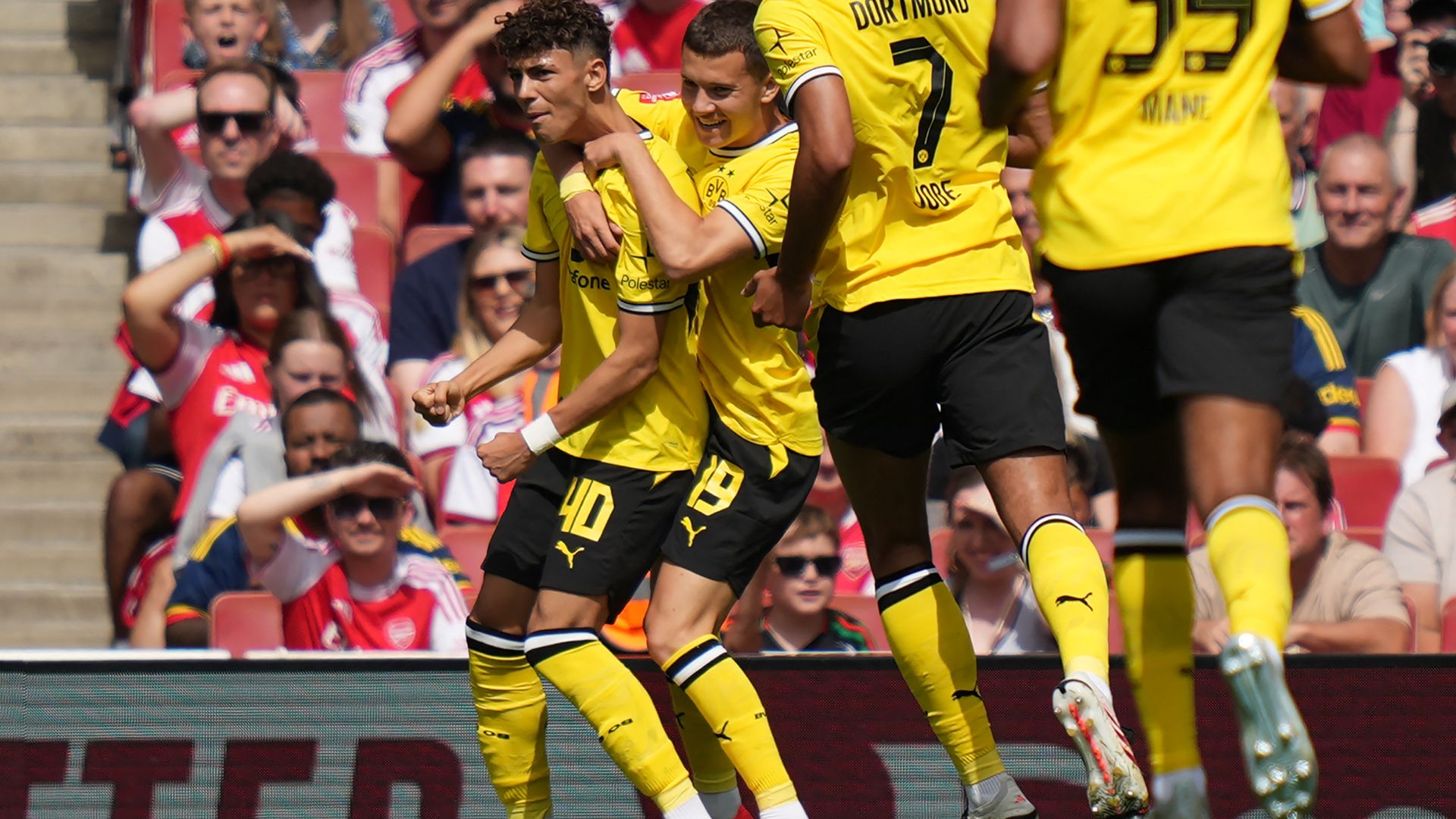 Arsenal's Defensive Woes Continue as Dortmund Claim Emirates Cup
